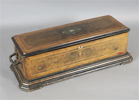 A late 19th century Swiss inlaid walnut and kingwood eight air musical box, width 34in. depth 14in. height 10.5in.